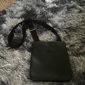Black Lacoste bag brand new without tags worn a couple times